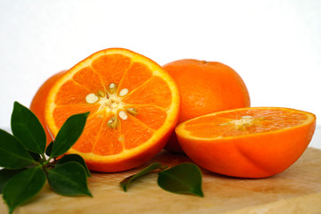 Close up of golden orange isolated on white background with copy and paste space