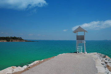 old white wooden hut with sea beach pier at khao laem ya in mu ko samet-national park rayong province thailand with blue sky background