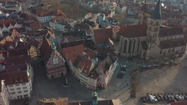 Aerial drone footage of the beautiful medieval german city of Esslingen am Neckar on a bright and sunny day with traditional architecture of Baden Wuerttemberg or Bavaria in Germany