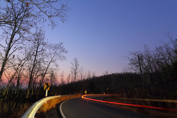 Fototapeta premium Sunrise at country roads in the country, Northern part of Thailand