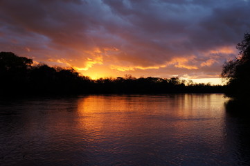 Fototapeta na wymiar Sunset on the river