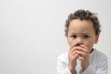 little boy with sweet chocolate Easter eggs