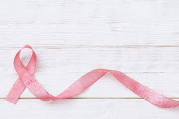 pink ribbon as  symbol of fighting breast cancer