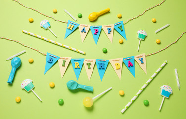 Minimal happy birthday decor for party. Sweet candy, balloons, straw.