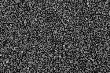 Black (gray) small crushed stones background texture