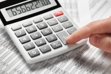 Businessman working and calculating finance. Business financial accounting concept. Closeup hands.