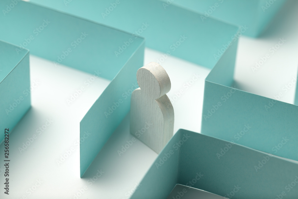 Poster the figure of the person is looking for a way out of the maze, a solution to the problem.