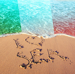 Beach sand, sea and flag Italy. I love Italy concept