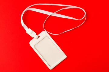 Fototapeta premium Blank security tag with a red stripe neck. Place for text, layout