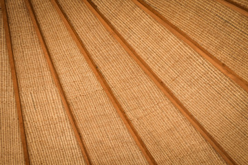 Timber framed woven bamboo ceiling for background. 