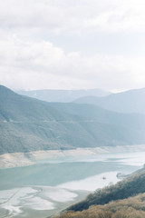 Ananuri reservoir at dawn and blue sky. Natural places and attractions.