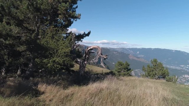 Mountains landscape from mountains hill. Shot. Picturesque view against blue sky