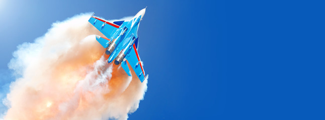 modern military fighter jet airplane flying surrounded by fire and smoke from explosion against...