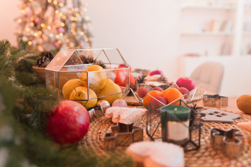 Christmas table setting with glass object. Cozy home interior decor. Abstract geometric shape of glass.