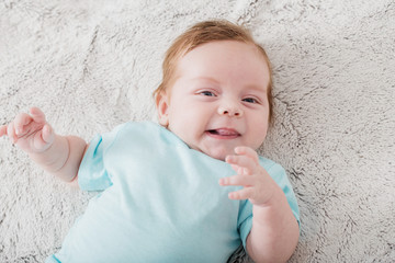 baby 2 months on bed