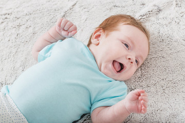 baby 2 months on bed