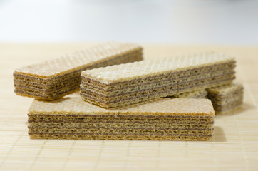 Classic waffles with butter and strawberry marmalade.