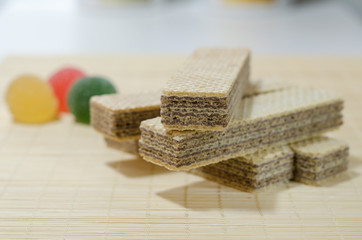 Classic waffles with butter and strawberry marmalade.