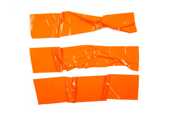 Set of orange tapes on white background