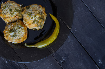 Meatballs on a plate on a wooden table