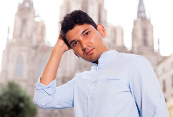 man posing in gothic quarter of Barcelona