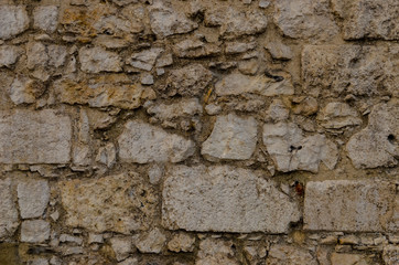 Abstract background - old sandstone wall.