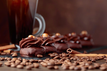  Chocolate dessert with hazelnut and coffee with cream.