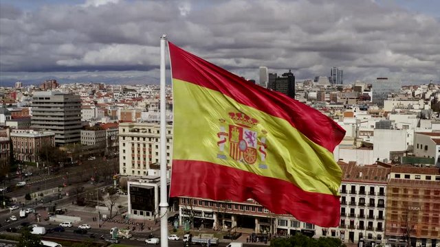 The spanish flag in Madrid, Spain on a sunny day. 