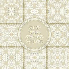 Compilation of floral patterns. White design with flowers on olive green background