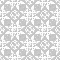  Monochrome seamless pattern. White flowers on gray background