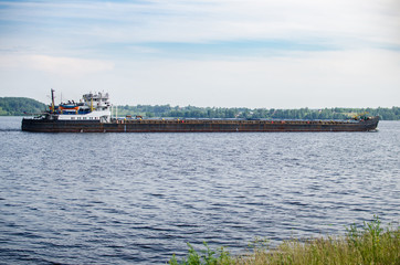 Fototapeta premium cargo ship on the river