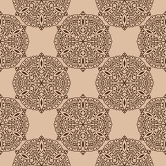 Beige and brown seamless pattern. Indian style background