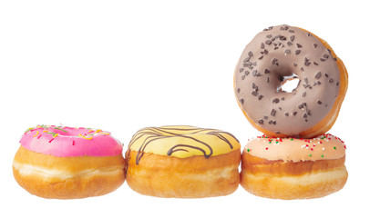 Delicious colorful donuts isolated on white background