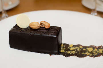 Selection of desserts, in a restaurant setting, with blurred background