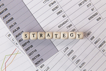 The strategy word on wood cube business content image.