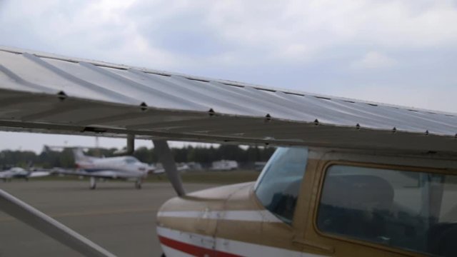 Wings and Flaps on Small Cessna 182 Airplane at Charlevoix Airport to Skydive Northern Michigan USA