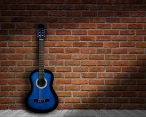 Fototapeta na wymiar acoustic guitar brick background wall shadow
