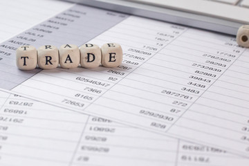 Obraz premium The Trade word on wood cube business content image.