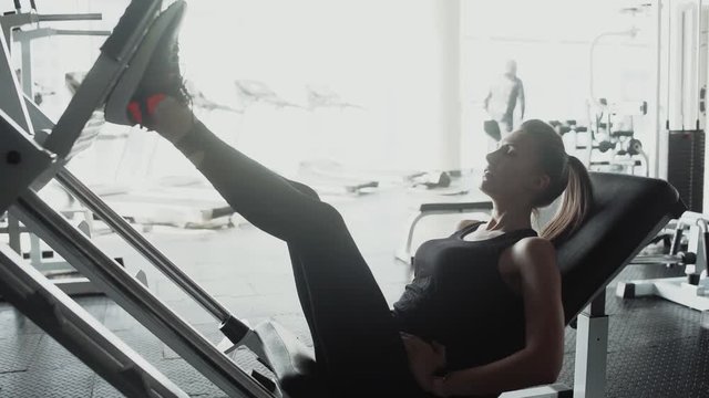 Sports girl in the gym