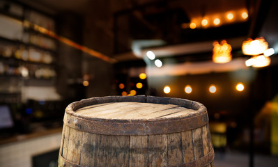 blurred background of bar and dark brown desk space of retro wood