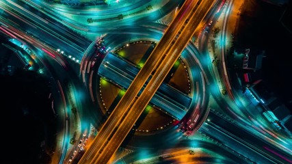 4K. Time lapse expressway top view, road traffic an important infrastructure in Thailand - Powered by Adobe