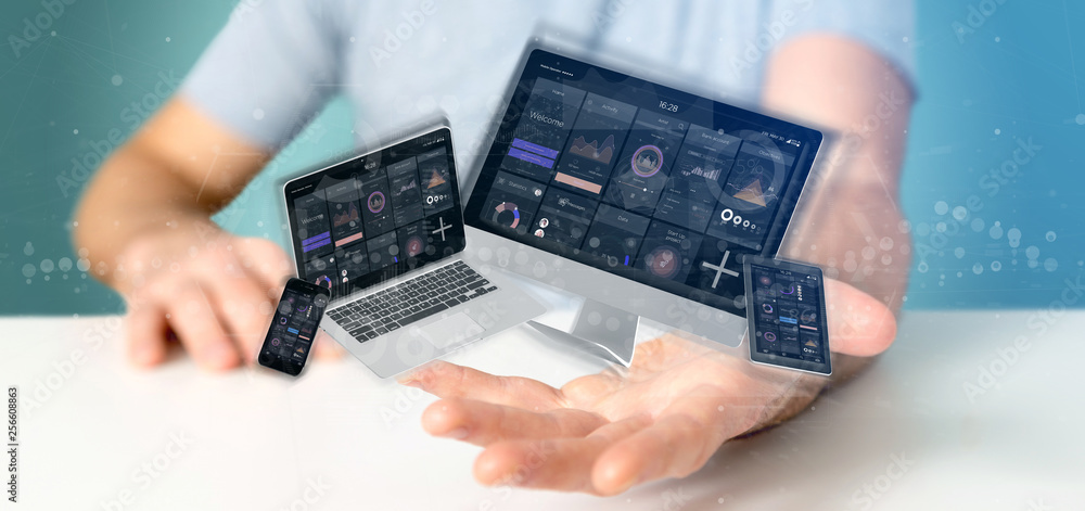 Poster businessman holding devices connected to a cloud multimedia network 3d rendering