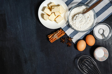 Baking background. Blend eggs with a mixer to make a dough. On a rustic background