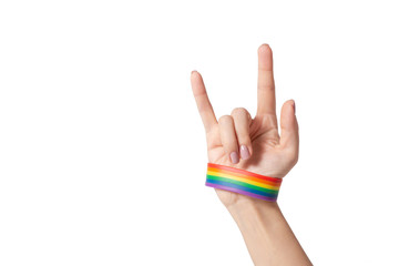 Isolated hand gesture with rainbow gay pride bracelet
