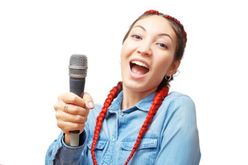 Happy asian woman singing with microphone isolated on white