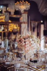wedding decorations with flowers and candles. banquet decor. picture with soft focus