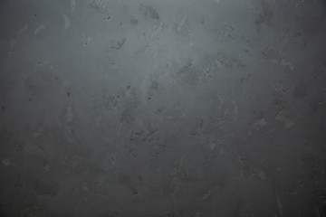 Dramatic grey grunge seamless stone texture venetian plaster background decor. Gray seamless stone venetian plaster texture.