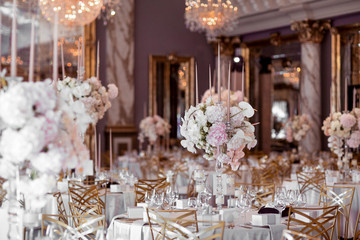 rustic wedding decorations with flowers and candles. banquet decor. picture with soft focus