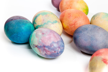 Group of easter painted eggs on white background