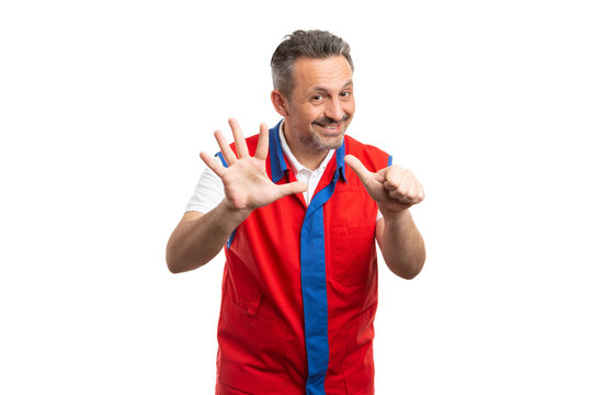 Supermarket Employee Holding Up Six Fingers.